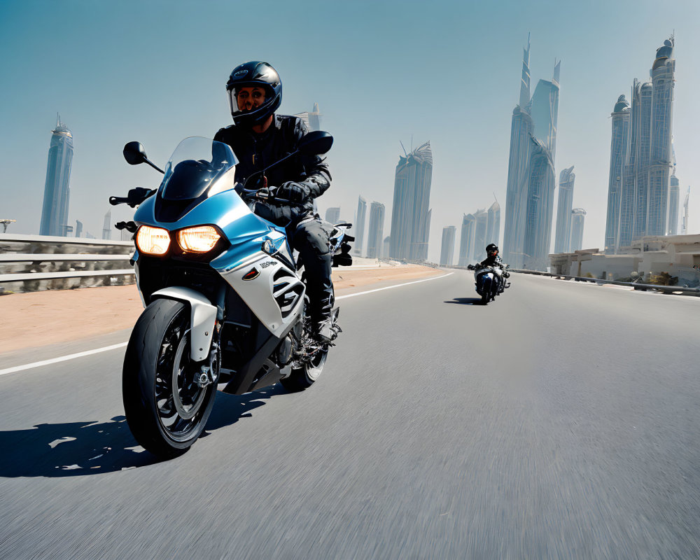 Motorcyclists on highway with city skyline and clear sky