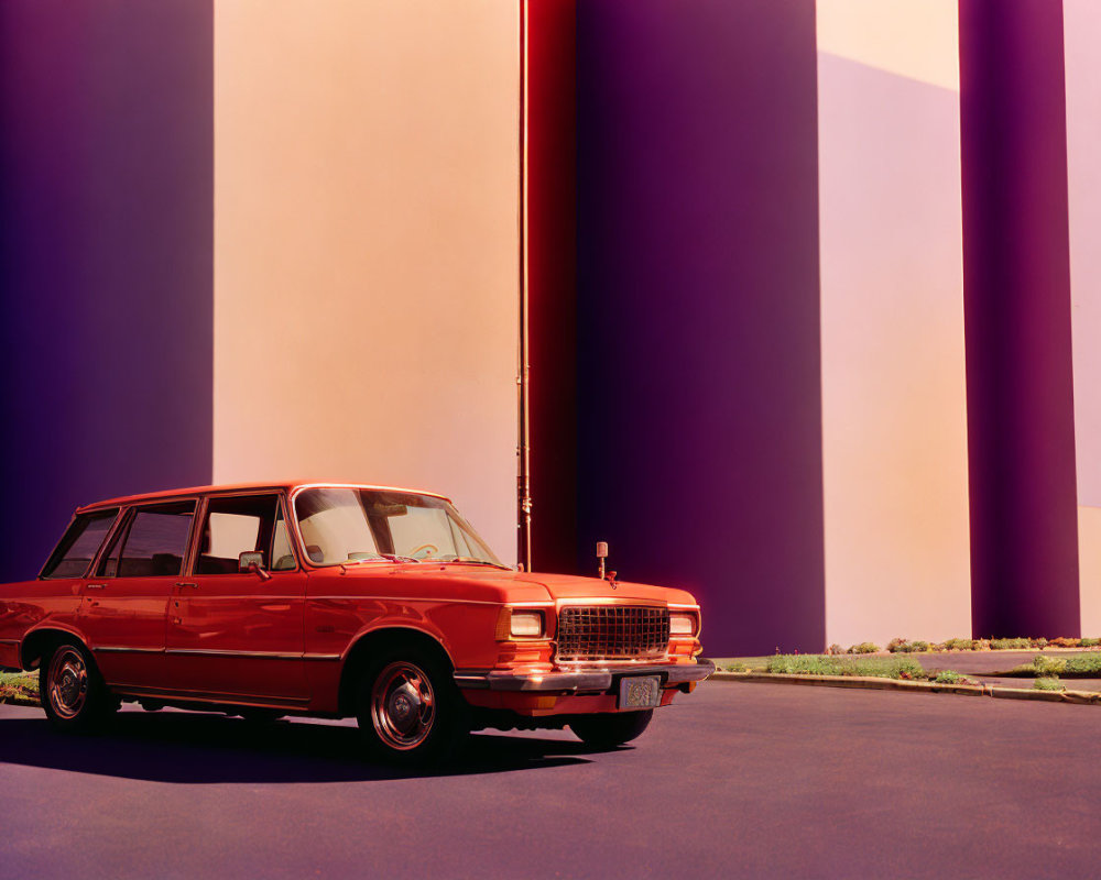 Vintage Red Station Wagon Beside Purple Walls with Red Stripe
