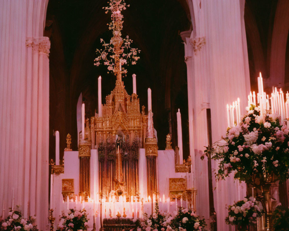 Golden Altar with Candles and Flowers in Arched Church Setting