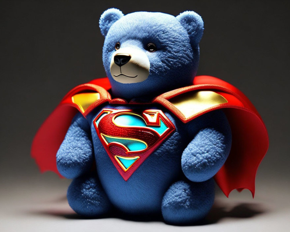 Blue Teddy Bear in Superman Costume with Red Cape on Grey Background