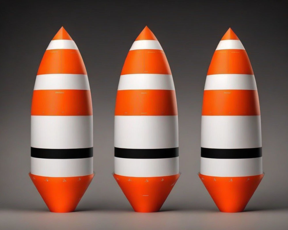 Orange and White Striped Traffic Cones with Black Band on Grey Background