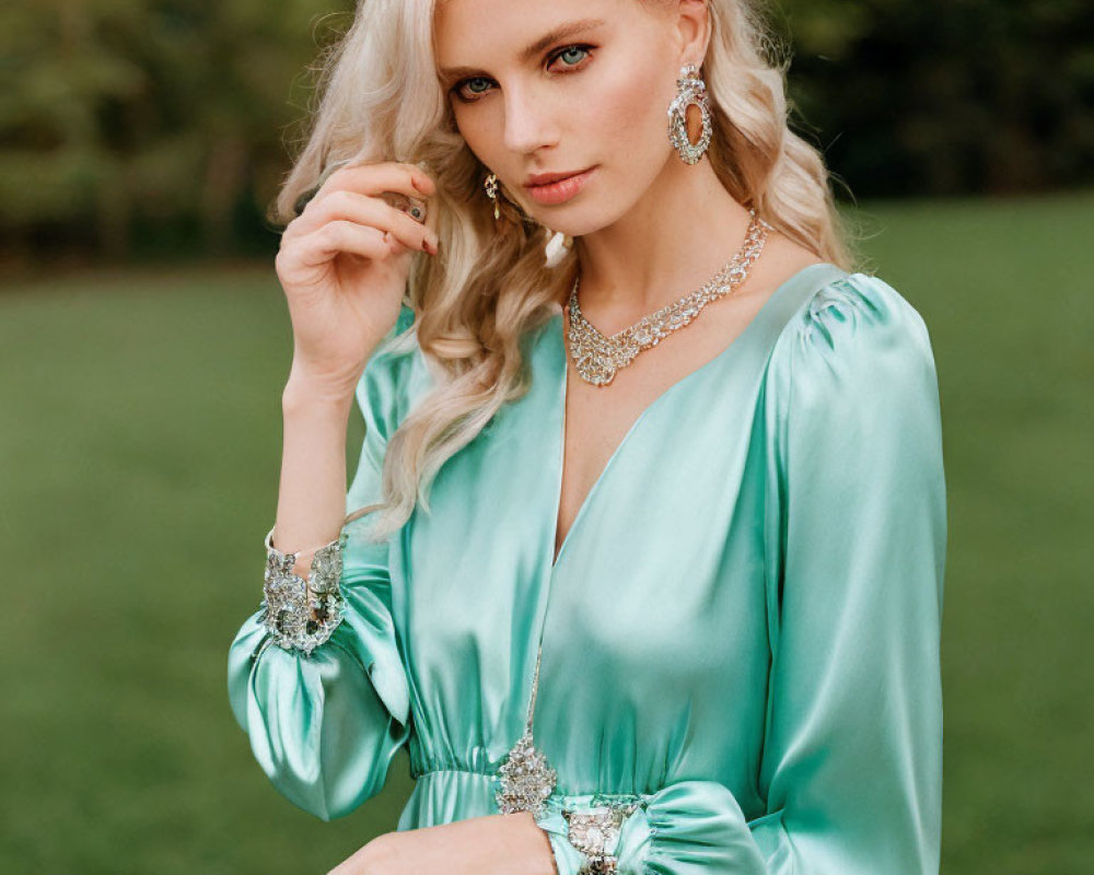 Blonde Woman in Turquoise Dress with Silver Jewelry Outdoors