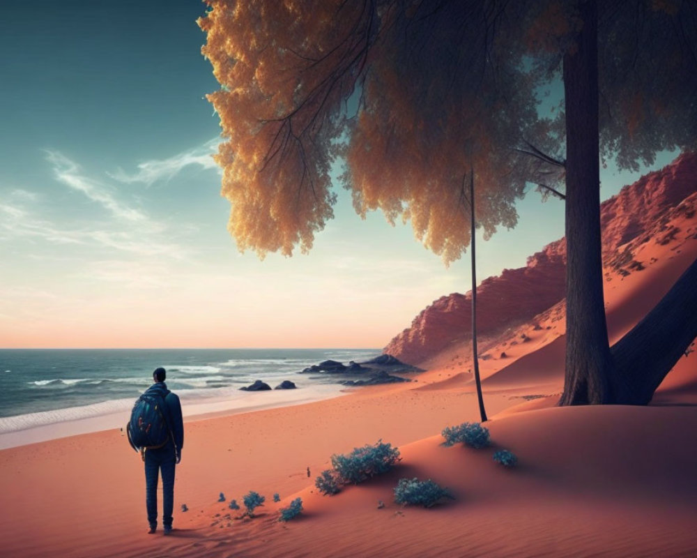 Backpacker walking on sandy beach with cliff and orange foliage