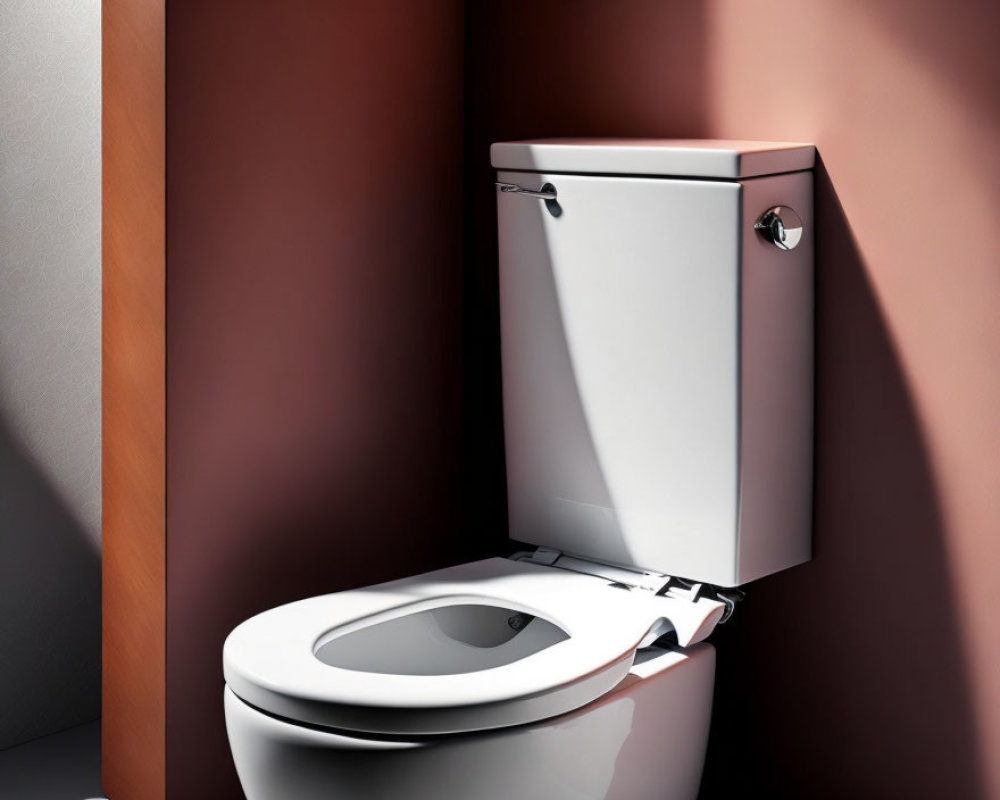 White modern toilet with open lid on warm-toned wall background