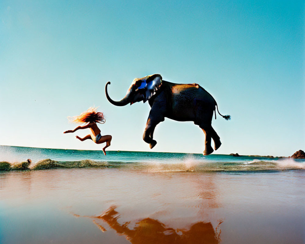 Person leaping near hovering elephant in surreal beach scene