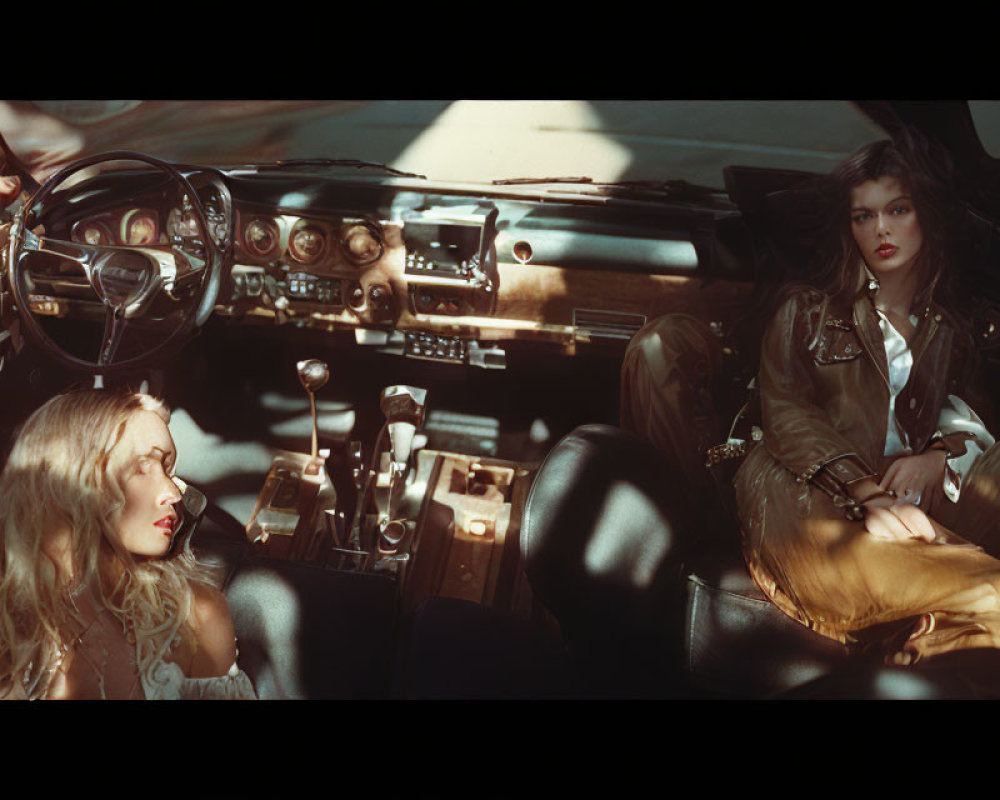Vintage car interior with two women in front seats under warm sunlight