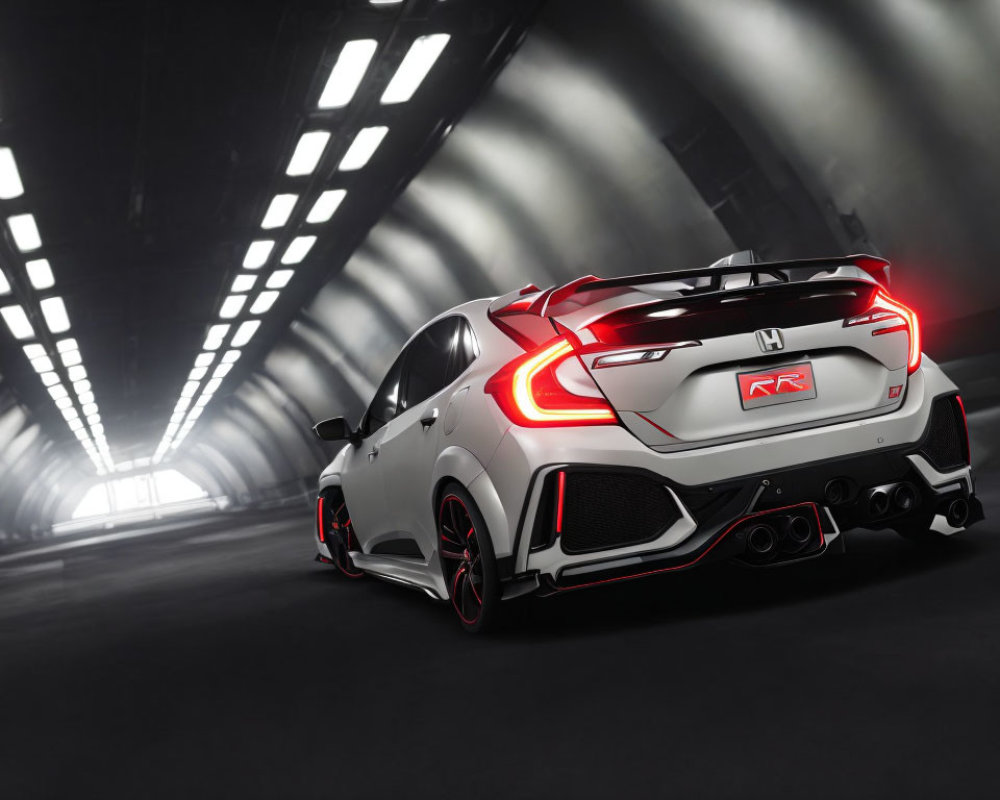 White Honda Civic Type R with Red Accents in Tunnel Displaying Sporty Rear Design